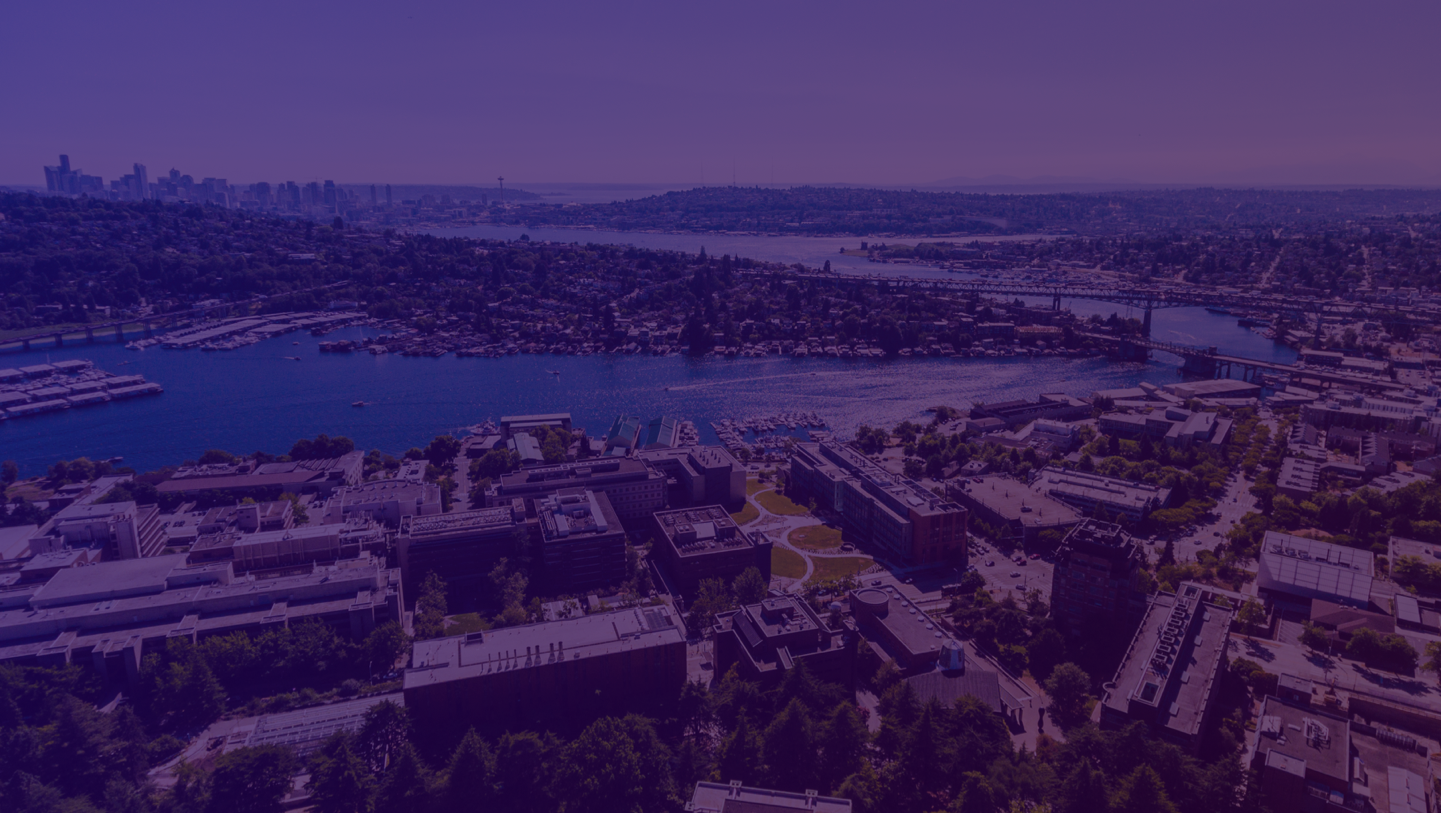 genetic counseling graduate program building near the water with Seattle skyline on the horizon
